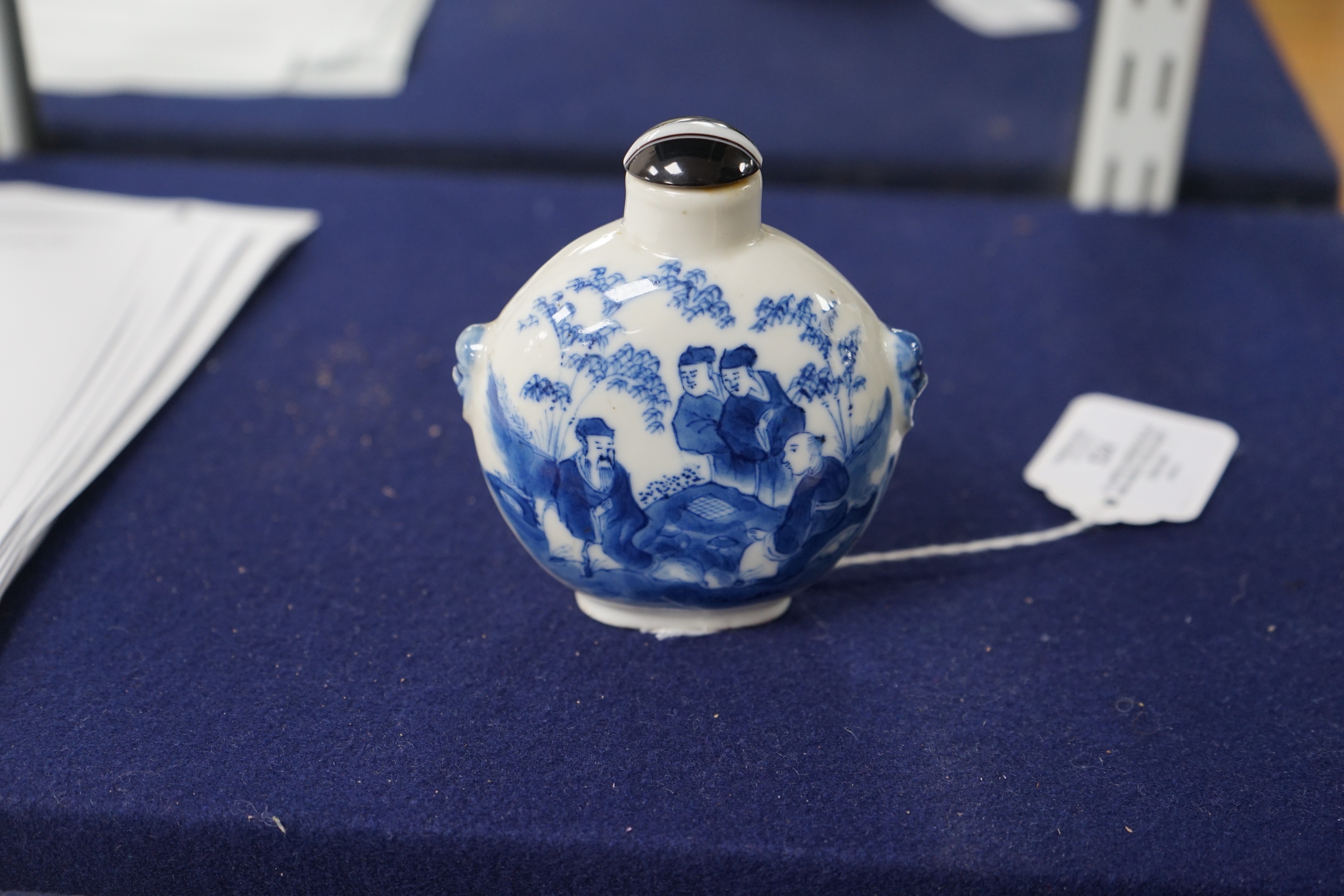 A large Chinese blue and white ‘scholars’ snuff bottle, 19th century, 9 cm high excluding later stopper